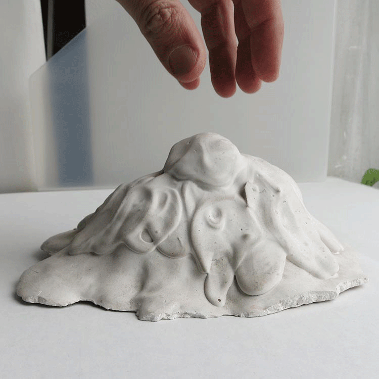 slump-faces 1989, sculptures by Olafur Thordarson, Plaaster of Paris, 12x19x14cm (var)